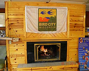 Bird City banner over fireplace at IMBD event